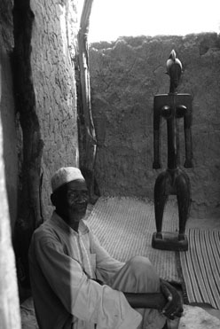 chief de village with Bamana sculpture, Sonango Village